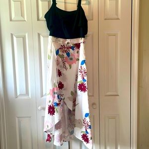 Black stretch top and white colorful flower skirt